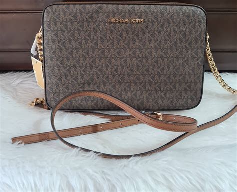 mk white sling bag|michael kors sling bag sale.